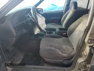 1996 Jeep Grand Cherokee Laredo with VIN 1J4GZ58S3TC297818, listed as a Copart auction lot 67712584 with 284,653 mi miles and Salvage Title. Bid and sale history available at carsss.com. Image 7.