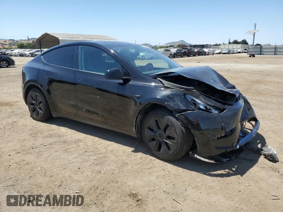 2024 Tesla Model Y Long Range with VIN 7SAYGAEE9RF125458, listed as a Copart auction lot 59567365 with 28,966 mi miles and Salvage title. Bid and sale history available at DreamBid. Image 4.