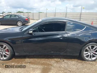 2014 Hyundai Genesis Coupe Ultimate with VIN KMHHU6KJ1EU120076, listed as a IAAI auction lot 42373762 with 100,537 mi miles and . Bid and sale history available at DreamBid. Image 15.