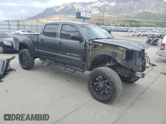 2014 Toyota Tacoma with VIN 3TMMU4FNXEM064955, listed as a Copart auction lot 57435005 with 120,967 mi miles and Salvage title. Bid and sale history available at DreamBid. Image 4.