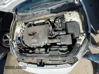 2014 Mazda 3 i Touring with VIN JM1BM1V78E1114550, listed as a Copart auction lot 57202185 with 100,722 mi miles and Clean Title. Bid and sale history available at DreamBid. Image 7.