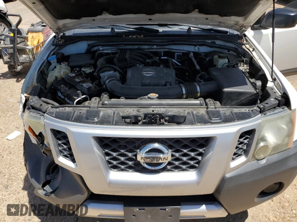 2014 Nissan Xterra S с VIN 5N1AN0NU4EN804826, выставлен на аукционе Copart как лот 53982175 с пробегом 178 250 миль миль и Списание • Salvage title. История ставок и продаж доступна на DreamBid. Изображение 12.