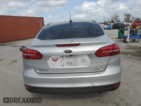 2016 Ford Focus SE с VIN 1FADP3F23GL236017, выставлен на аукционе Copart как лот 47683555 с пробегом Не указан миль и Списание • Salvage title. История ставок и продаж доступна на DreamBid. Изображение 6.