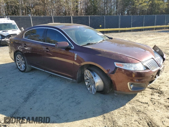 2012 Lincoln MKS with VIN 1LNHL9ER2CG802577, listed as a Copart auction lot 85455164 with 121,169 mi miles and Salvage Title. Bid and sale history available at DreamBid. Image 4.