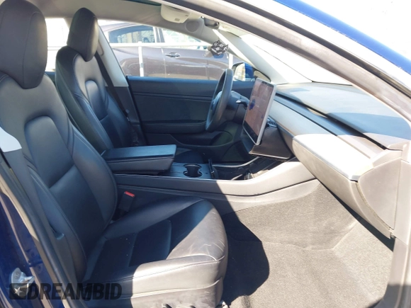2019 Tesla Model 3 Mid Range with VIN 5YJ3E1EA8KF436086, listed as a IAAI auction lot 41682093 with 70,332 mi miles and . Bid and sale history available at DreamBid. Image 5.