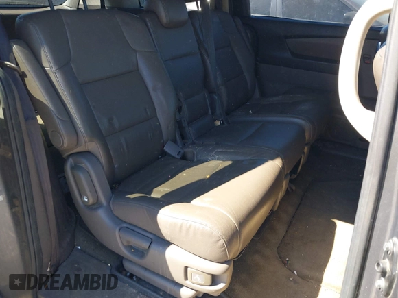 2014 Honda Odyssey EX-L with VIN 5FNRL5H61EB014695, listed as a IAAI auction lot 41694860 with 261,265 mi miles and . Bid and sale history available at DreamBid. Image 8.