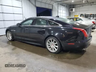 2016 Jaguar XJ R-Sport with VIN SAJWJ1CDXG8V99210, listed as a Copart auction lot 82693224 with 81,978 mi miles and Salvage title. Bid and sale history available at DreamBid. Image 2.