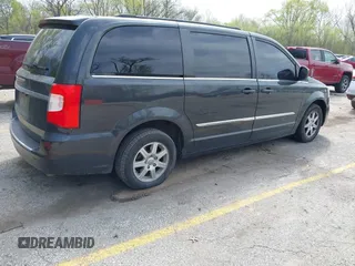 2012 Chrysler Town & Country Touring with VIN 2C4RC1BG3CR282465, listed as a IAAI auction lot 42001694 with 265,663 mi miles. Bid and sale history available at carsss.com. Image 4.