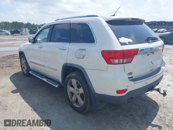 2012 Jeep Grand Cherokee Overland with VIN 1C4RJECT8CC195064, listed as a IAAI auction lot 41860187 with 241,367 mi miles. Bid and sale history available at carsss.com. Image 3.