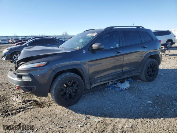 2015 Jeep Cherokee Trailhawk with VIN 1C4PJMBS1FW716848, listed as a Copart auction lot 89386605 with 134,159 mi miles and Salvage Title. Bid and sale history available at carsss.com. Image 1.