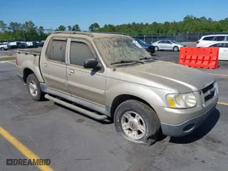 2004 Ford Explorer Sport Trac XLS with VIN 1FMZU67K24UA66100, listed as a IAAI auction lot 42035953 with 217,105 mi miles. Bid and sale history available at carsss.com. Image 1.