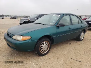 1997 Ford Escort LX with VIN 1FALP13P8VW264150, listed as a Copart auction lot 87328394 with 127,934 mi miles and Salvage Title. Bid and sale history available at carsss.com. Image 1.