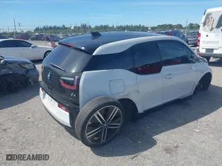 2017 BMW i3 with VIN WBY1Z8C32HV891355, listed as a IAAI auction lot 41723555 with 77,773 mi miles. Bid and sale history available at carsss.com. Image 4.