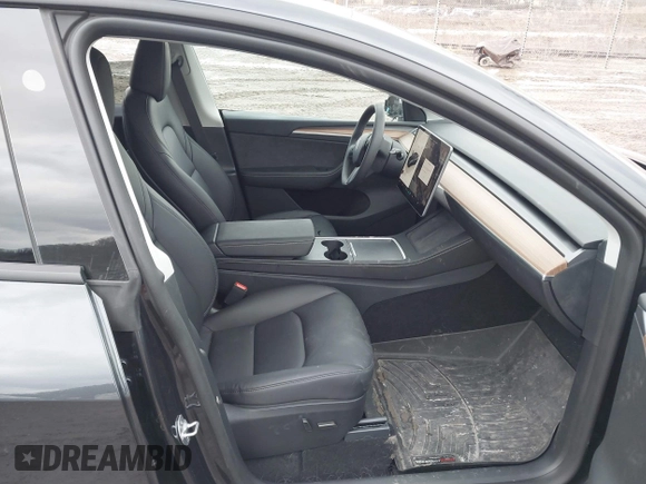 2024 Tesla Model Y Performance with VIN 7SAYGDEF7RF020203, listed as a IAAI auction lot 41639077 with 14,493 mi miles and . Bid and sale history available at DreamBid. Image 5.