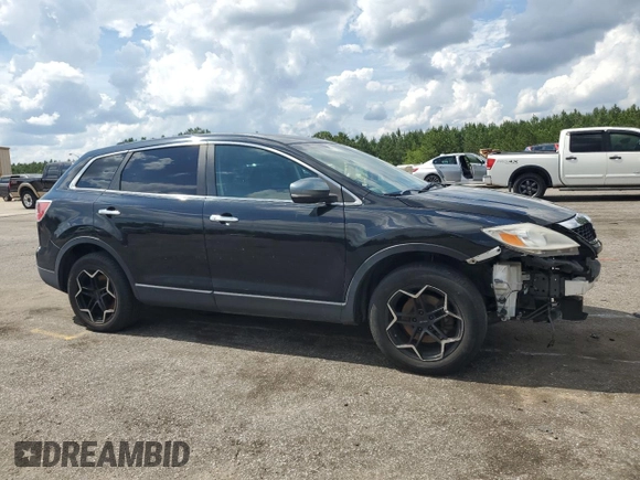 2012 Mazda CX-9 Grand Touring z VIN JM3TB2DAXC0358272, wystawiony jako Copart lot #60703665 z przebiegiem 278 558 mil mil oraz Szkoda całkowita • Salvage title. Historia ofert i sprzedaży dostępna na DreamBid. Obrazek 4.