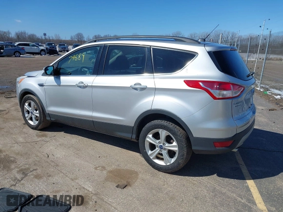 2014 Ford Escape SE with VIN 1FMCU0GX6EUE34729, listed as a IAAI auction lot 41879689 with 167,600 mi miles and . Bid and sale history available at DreamBid. Image 3.