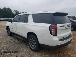 2021 Chevrolet Suburban with VIN 1GNSCCKT6MR473628, listed as a Copart auction lot 87695725 with 57,110 mi miles and Salvage title. Bid and sale history available at DreamBid. Image 2.