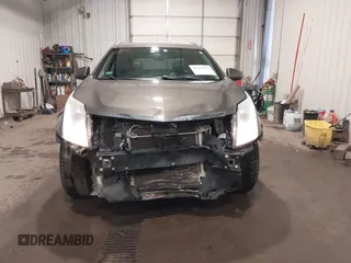2014 Cadillac SRX Performance Collection z VIN 3GYFNFE38ES578066, wystawiony jako IAAI lot #42153023 z przebiegiem 134 009 mil mil oraz . Historia ofert i sprzedaży dostępna na DreamBid. Obrazek 13.