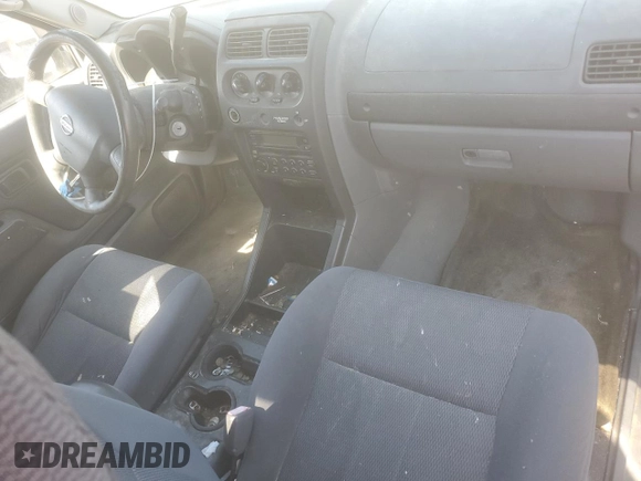 2003 Nissan Frontier XE with VIN 1N6DD26T13C464577, listed as a Copart auction lot 56722705 with 165,736 mi miles and Clean title. Bid and sale history available at DreamBid. Image 8.