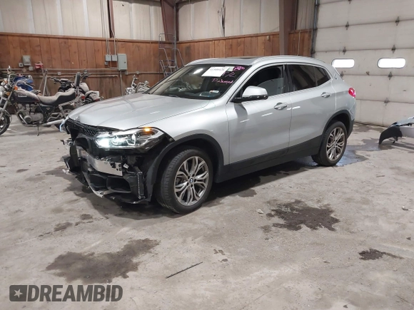 2020 BMW X2 xDrive28i with VIN WBXYJ1C09L5P35894, listed as a IAAI auction lot 41588426 with 24,476 mi miles. Bid and sale history available at carsss.com. Image 2.
