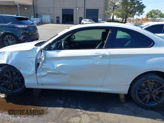 2016 BMW 2 Series M235i with VIN WBA1J7C5XGV359562, listed as a IAAI auction lot 39990299 with 54,022 mi miles. Bid and sale history available at carsss.com. Image 14.