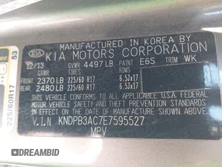 2014 Kia Sportage LX with VIN KNDPB3AC7E7595527, listed as a IAAI auction lot 42062615 with 64,777 mi miles. Bid and sale history available at carsss.com. Image 9.