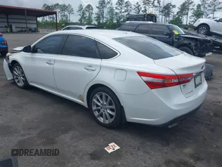 2013 Toyota Avalon XLE with VIN 4T1BK1EB4DU047982, listed as a IAAI auction lot 42011402 with 122,645 mi miles and . Bid and sale history available at DreamBid. Image 3.