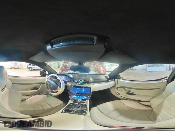 2013 Maserati GranTurismo Sport with VIN ZAM45VLA1D0073304, listed as a Copart auction lot 77509974 with 76,038 mi miles and Salvage title. Bid and sale history available at DreamBid. Image 12.
