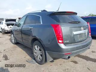 2012 Cadillac SRX Luxury Collection z VIN 3GYFNAE39CS659562, wystawiony jako IAAI lot #42109525 z przebiegiem 151 051 mil mil oraz . Historia ofert i sprzedaży dostępna na DreamBid. Obrazek 3.