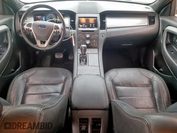 2014 Ford Taurus SEL z VIN 1FAHP2E84EG133955, wystawiony jako Copart lot #56630155 z przebiegiem 113 045 mil mil oraz Szkoda całkowita • Salvage title. Historia ofert i sprzedaży dostępna na DreamBid. Obrazek 8.