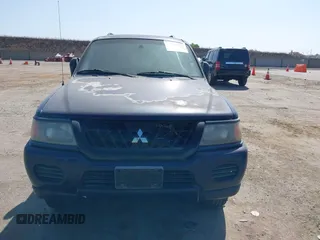2002 Mitsubishi Montero ES z VIN JA4LS21H72J064812, wystawiony jako IAAI lot #42395976 z przebiegiem 131 436 mil mil oraz . Historia ofert i sprzedaży dostępna na DreamBid. Obrazek 6.