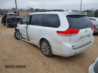 2011 Toyota Sienna XLE with VIN 5TDDK3DC0BS015244, listed as a IAAI auction lot 41413002 with 128,591 mi miles. Bid and sale history available at carsss.com. Image 3.