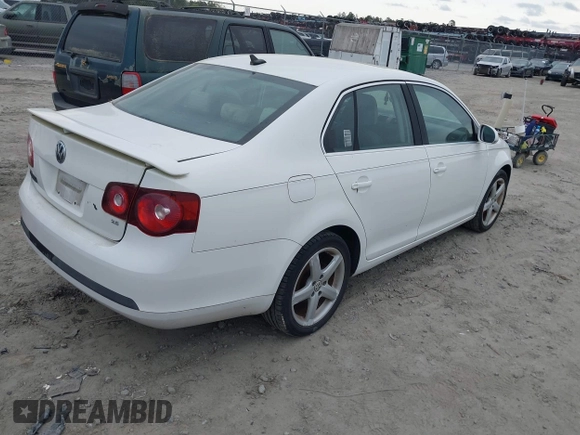 2009 Volkswagen Jetta Sedan SE with VIN 3VWRM71K99M068342, listed as a IAAI auction lot 41876215 with 161,633 mi miles. Bid and sale history available at carsss.com. Image 4.