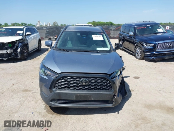 2023 Toyota Corolla Cross LE with VIN 7MUCAAAGXPV045651, listed as a IAAI auction lot 42006289 with 23,282 mi miles and . Bid and sale history available at DreamBid. Image 12.