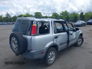 2001 Honda CR-V LX with VIN JHLRD28481C000183, listed as a IAAI auction lot 40053528 with 267,076 mi miles. Bid and sale history available at carsss.com. Image 4.