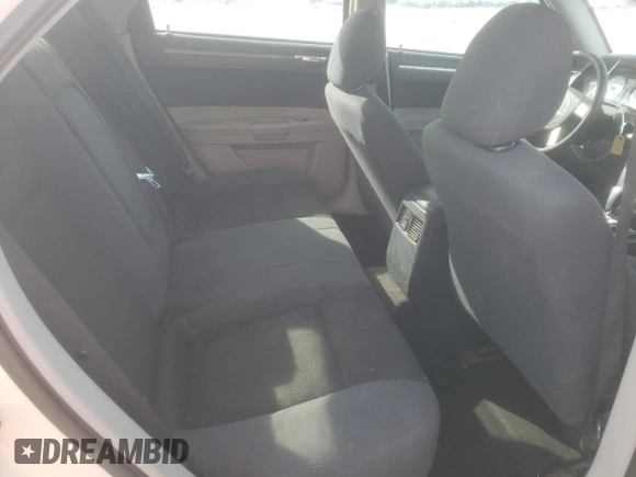 2005 Chrysler 300 with VIN 2C3JA43R25H663094, listed as a Copart auction lot 60813664 with 218,830 mi miles and Salvage Title. Bid and sale history available at carsss.com. Image 10.