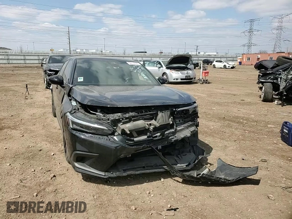 2022 Honda Civic Sport z VIN 2HGFE2F58NH600358, wystawiony jako Copart lot #52738505 z przebiegiem 62 275 mil mil oraz Szkoda całkowita • Salvage title. Historia ofert i sprzedaży dostępna na DreamBid. Obrazek 11.