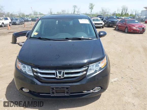 2014 Honda Odyssey Touring with VIN 5FNRL5H94EB079518, listed as a IAAI auction lot 42095098 with 141,019 mi miles and . Bid and sale history available at DreamBid. Image 13.