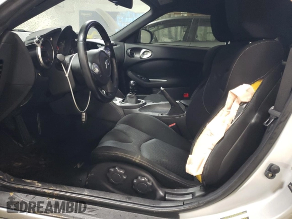 2014 Nissan 370Z Nismo with VIN JN1AZ4EH2EM636132, listed as a Copart auction lot 87218744 with 39,254 mi miles and Salvage Title. Bid and sale history available at DreamBid. Image 7.