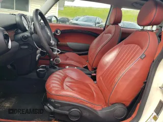 2008 MINI Hardtop with VIN WMWMF33508TT65360, listed as a Copart auction lot 58693445 with 105,783 mi miles and Salvage title. Bid and sale history available at DreamBid. Image 7.