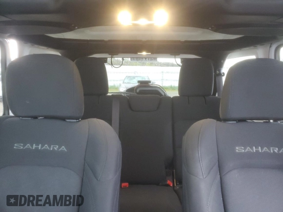 2019 Jeep Wrangler Unlimited Sahara with VIN 1C4HJXEG5KW600639, listed as a Copart auction lot 49314565 with 58,637 mi miles and Salvage title. Bid and sale history available at DreamBid. Image 10.