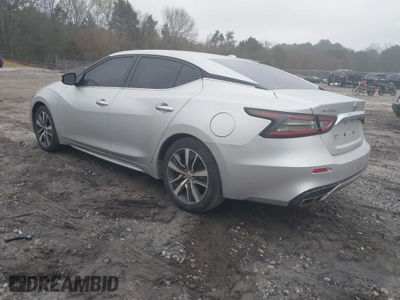 2019 Nissan Maxima Platinum z VIN 1N4AA6AV6KC372254, wystawiony jako IAAI lot #41519515 z przebiegiem 124 326 mil mil oraz . Historia ofert i sprzedaży dostępna na DreamBid. Obrazek 3.
