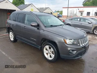 2016 Jeep Compass Latitude with VIN 1C4NJCEB1GD664633, listed as a IAAI auction lot 42073401 with 188,632 mi miles. Bid and sale history available at carsss.com. Image 1.