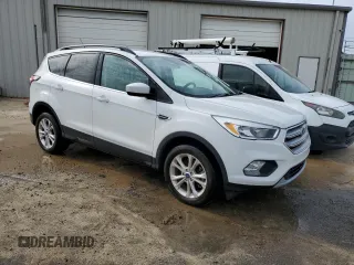 2018 Ford Escape SE z VIN 1FMCU9GD5JUB29050, wystawiony jako Copart lot #55166745 z przebiegiem 79 939 mil mil oraz Czysty tytuł • Clean title. Historia ofert i sprzedaży dostępna na DreamBid. Obrazek 4.