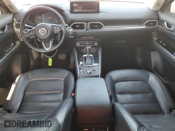 2021 Mazda CX-5 Grand Touring with VIN JM3KFBDM4M1462570, listed as a Copart auction lot 54827675 with 45,389 mi miles and Salvage Title. Bid and sale history available at DreamBid. Image 8.