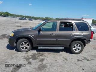 2006 Mazda Tribute i with VIN 4F2YZ02Z36KM29148, listed as a IAAI auction lot 42044163 with 175,786 mi miles and . Bid and sale history available at carsss.com. Image 14.