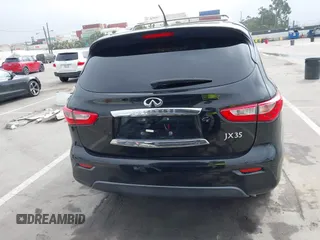2013 Infiniti JX35 with VIN 5N1AL0MN7DC310972, listed as a IAAI auction lot 41859376 with 117,679 mi miles. Bid and sale history available at carsss.com. Image 16.