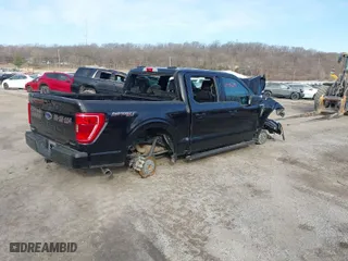 2023 Ford F-150 XL with VIN 1FTEW1EP3PKD48647, listed as a IAAI auction lot 40584659 with 50,841 mi miles. Bid and sale history available at carsss.com. Image 4.