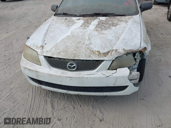 2003 Mazda Protege DX with VIN JM1BJ225730146488, listed as a IAAI auction lot 42086747 with Not Provided miles and . Bid and sale history available at DreamBid. Image 6.