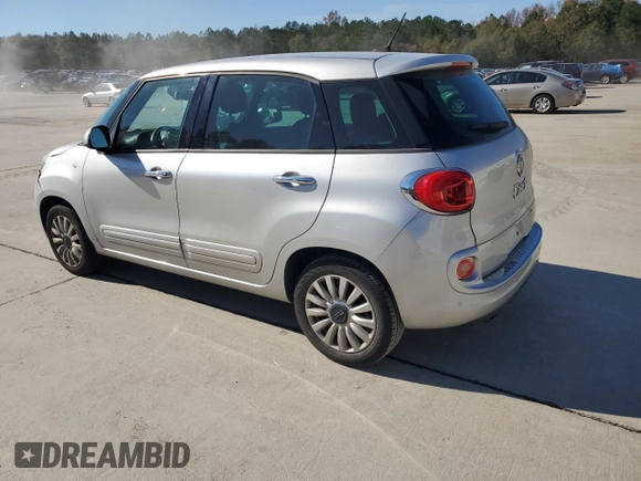 2014 FIAT 500L Easy with VIN ZFBCFABH8EZ000709, listed as a Copart auction lot 82097694 with 72,984 mi miles and Salvage title. Bid and sale history available at DreamBid. Image 2.